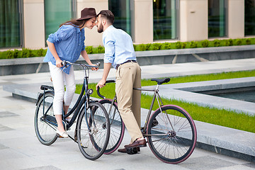 Image showing Romantic date of young couple on bicycles