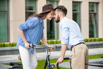 Image showing Romantic date of young couple on bicycles