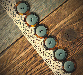 Image showing vintage buttons and antique lace