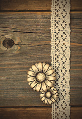 Image showing vintage metal buttons flowers and lace ribbons