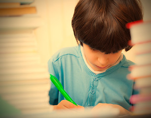 Image showing schoolboy doing homework