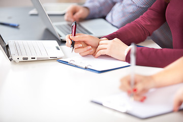 Image showing hands with a  pen