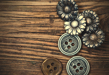 Image showing several vintage metal buttons