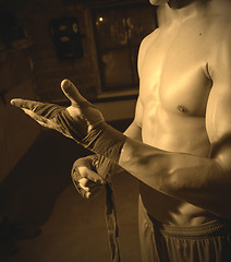 Image showing fighter prepares hands for sparring