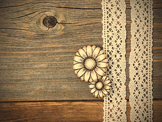 Image showing vintage metal buttons flowers and lace ribbons