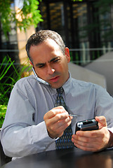 Image showing Businessman busy