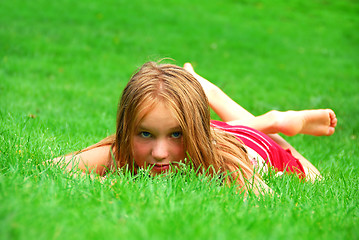 Image showing Young girl grass