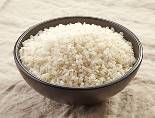 Image showing bowl of raw round rice