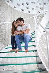 Image showing relaxed yung couple at home  stairs
