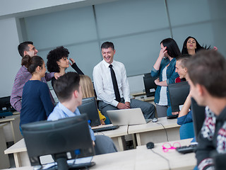 Image showing students with teacher  in computer lab classrom