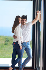 Image showing relaxed young couple at home staircase