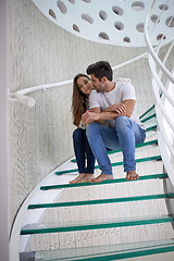 Image showing relaxed yung couple at home  stairs