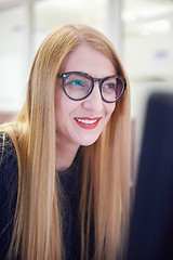 Image showing business woman working on computer at office