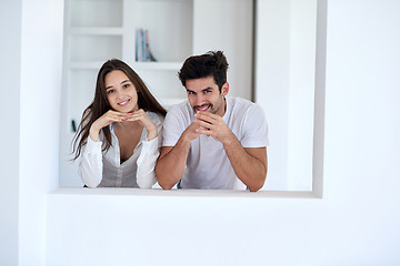 Image showing relaxed young couple at home staircase