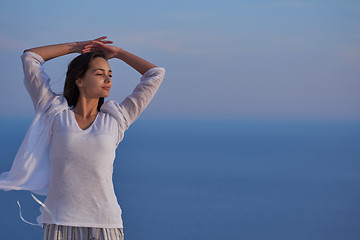 Image showing young woman enjoy sunset