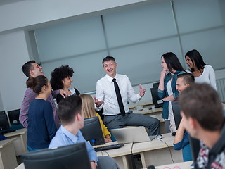 Image showing students with teacher  in computer lab classrom