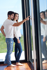 Image showing relaxed young couple at home staircase