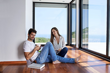 Image showing relaxed young couple at home staircase