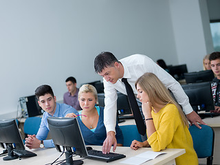 Image showing students with teacher  in computer lab classrom