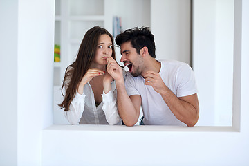 Image showing relaxed young couple at home staircase