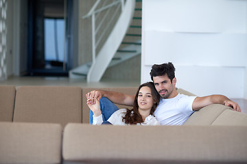 Image showing relaxed young couple at home staircase