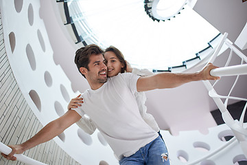 Image showing relaxed yung couple at home  stairs