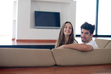 Image showing relaxed young couple at home staircase