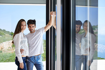 Image showing relaxed young couple at home staircase