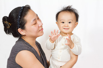 Image showing Asian Mom and baby