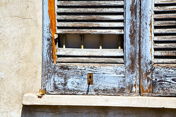 Image showing  window  lonate  abstract      wood venetian blind in the concre