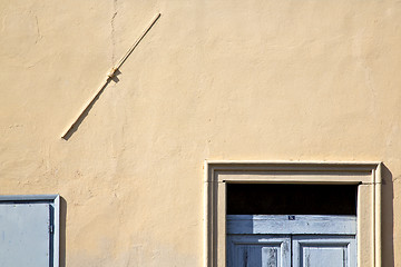 Image showing   in venegono italy   the old  wall  and church door  