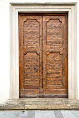 Image showing old castronno   italy   the   wall  and church    door  