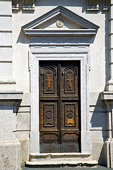 Image showing old castronno abstract in  italy    and church door  