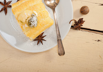 Image showing cream roll cake dessert and spices 