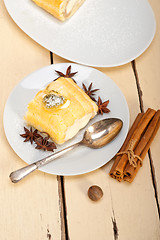 Image showing cream roll cake dessert and spices 