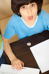 Image showing schoolboy doing homework