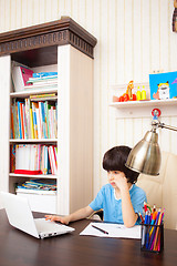 Image showing schoolboy doing homework