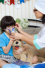 Image showing children\'s physician spends boy inhalation session