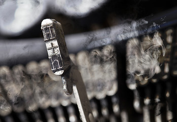 Image showing H hammer - old manual typewriter - mystery smoke