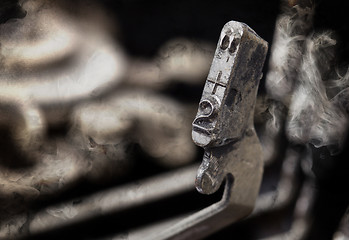 Image showing 2 hammer - old manual typewriter - mystery smoke