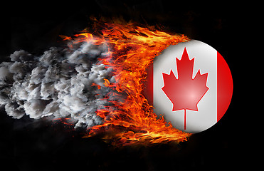 Image showing Flag with a trail of fire and smoke - Canada