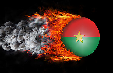 Image showing Flag with a trail of fire and smoke - Burkina Faso