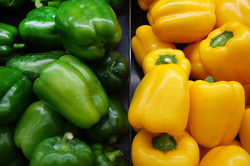 Image showing Green and yellow bell peppers