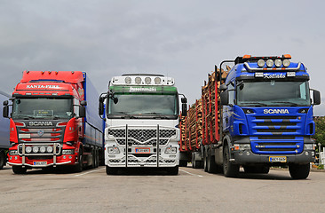 Image showing Scania and Mercedes-Benz Actros Trucks Parked
