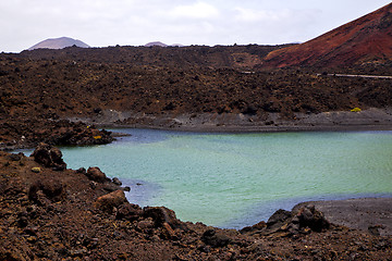 Image showing car street people  stone  atlantic ocean sky   in el golfo  spai