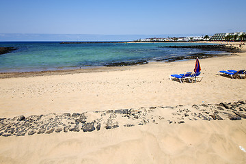 Image showing umbrella people   coaststone   