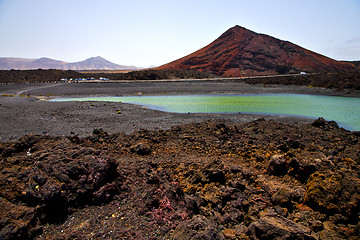 Image showing car street people  stone  atlantic ocean sky   pond rock  coastl