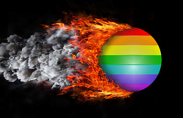 Image showing Flag with a trail of fire and smoke - Rainbow flag