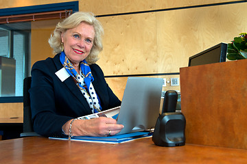 Image showing senior receptionist