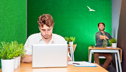 Image showing Throwing paper planes